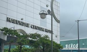 a sign on the side of a building at Centum City Hotel in Busan