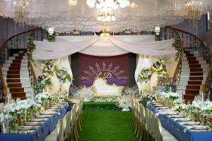 a set up for a wedding with tables and chairs at LD Ignacio Island Resort in Roxas +2 photos