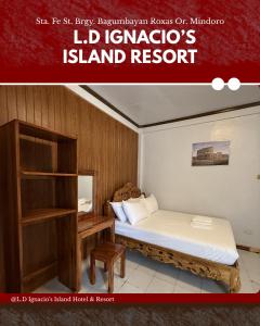 a small room with a bed and a book shelf at LD Ignacio Island Resort in Roxas