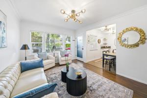 a living room with a couch and a table at Venice Venice in Los Angeles