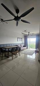 a large living room with a ceiling fan at KP1011 Guest House in Puchong