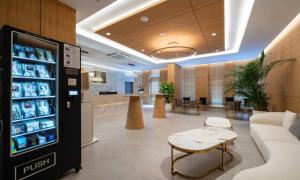 a lobby with a drink vending machine in a store at The hound hotel bandalseom2 in Ansan