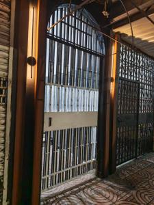 an entrance to a room with a large gate at Santa lucia in Panama City