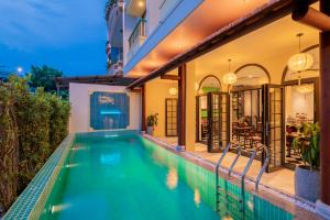 an image of a swimming pool in a house at BACKHOME BOUTIQUE Old Town Hoi An in Hoi An