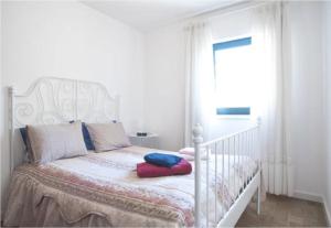Łóżko lub łóżka w pokoju w obiekcie Apartamento T Boavista Casa da Música