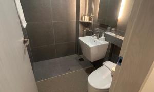 a small bathroom with a toilet and a sink at Pohang Daejamdong Route 422 in Pohang +41 photos