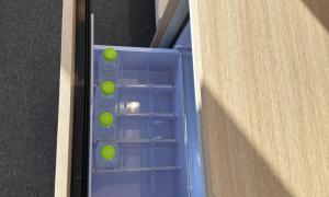 a small blue refrigerator with green balls in it at Pohang Daejamdong Route 422 in Pohang