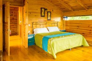 Postel nebo postele na pokoji v ubytování Cabañas el Chalet