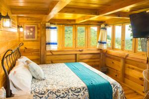 Postel nebo postele na pokoji v ubytování Cabañas el Chalet