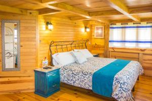 Postel nebo postele na pokoji v ubytování Cabañas el Chalet