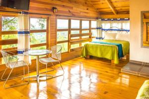 Postel nebo postele na pokoji v ubytování Cabañas el Chalet