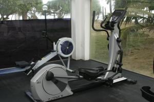 a treadmill in a room with a window at Siddhalepa Ayurveda Resort - All Meals, Ayurveda Treatment and Yoga in Wadduwa