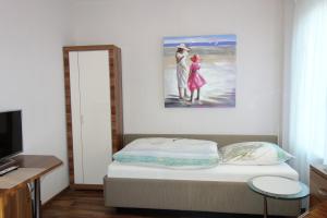 Postel nebo postele na pokoji v ubytování Hotel Gode Wind