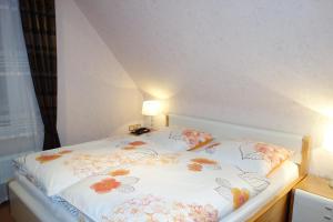 Postel nebo postele na pokoji v ubytování Hotel Gode Wind