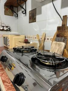 a kitchen with a stove top in a room at Casa Castillo in Moratalla