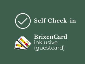 a sign that reads self check in biryani car inclusiveavascriptucustainable at Bergheim Plose - Appartements in St Andrä bei Brixen in Bressanone