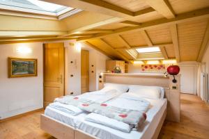 Postel nebo postele na pokoji v ubytování Bio Agritur Le Millemele + 37 fotografií