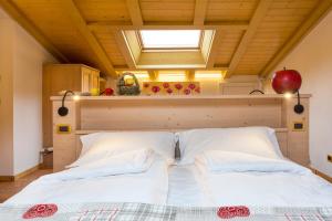 Postel nebo postele na pokoji v ubytování Bio Agritur Le Millemele
