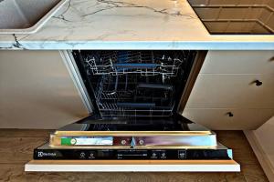an oven with some dishes inside of it at Storm Villas in Sturmai