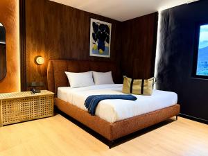 a bedroom with a large bed in a room at Bonbon Hotel in Kluang +32 photos