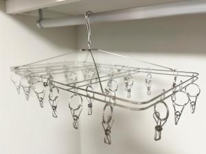 a glass chandelier hanging from a ceiling at Hotel Suite 2 in Warabi
