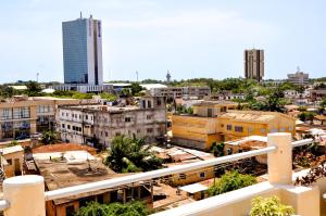 a city view of a city with buildings at Guest House Lumen in Lomé