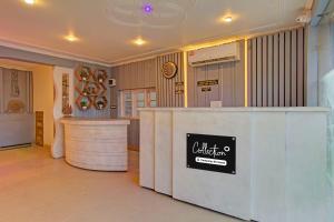 a restaurant with a counter with a sign on it at Super Collection O Padshahi Bagh Formerly Matamal Cafe in Jawāharnagar