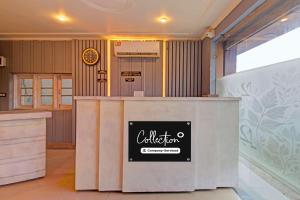 a restaurant with a counter with a sign on it at Super Collection O Padshahi Bagh Formerly Matamal Cafe in Jawāharnagar