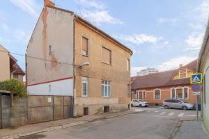 an old building on the side of a street at Azure Wave - Ultra Central in Oradea