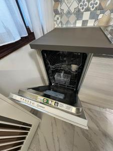 an open oven with a tablet inside of it at Casa Alba in Chioggia