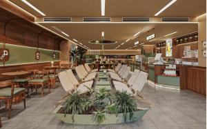a restaurant with chairs and tables and a counter at Reviah Hotel in Hanoi