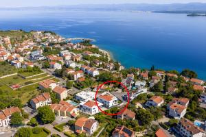 an aerial view of a small town by the water at Villa Sarah in Vantačići