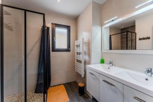 a bathroom with a sink and a shower at Le Reve Mimizan Plage in Mimizan-Plage +21 photos