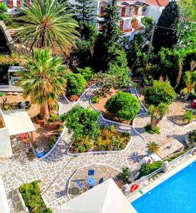 an aerial view of a garden next to a swimming pool at Villa Rena in Batsi