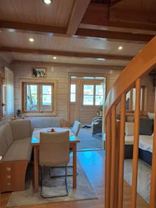 a living room with a couch and a table at Haus Marlies in Spielberg