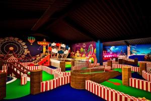 an indoor amusement park with a roller coaster and rides at Static Caravan Sleeps 8 with Indoor Pool in Clacton-on-Sea
