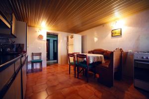 Kuchyň nebo kuchyňský kout v ubytování Apartment Gardenia + 23 fotografií