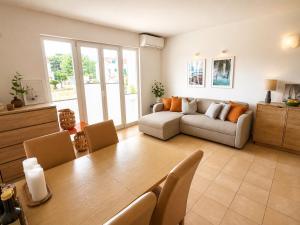 a living room with a table and a couch at Mirca by the Sea in Mirce +57 photos