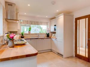 a kitchen with a counter and a sink and a window at 2 Bed in Wareham oc-75483 in Corfe Castle