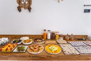 a table topped with lots of different types of food at Costa Viva Bodrum in Bodrum City +86 photos