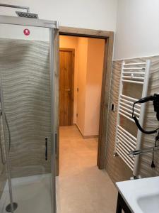 a shower with a glass door in a bathroom at B&B Capo Vaticano Stay in Capo Vaticano +38 photos