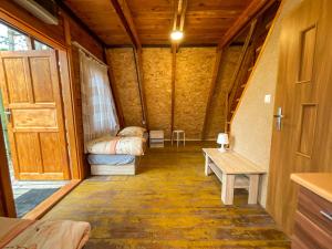 a room with a room with a door and a table at Przygoda nad Wartą in Burzenin