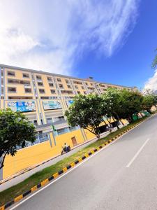 an empty street in front of a building at SkyNest in Dehradun