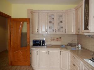 A kitchen or kitchenette at Private Apartment