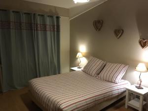 Postel nebo postele na pokoji v ubytování Hotel Le Central