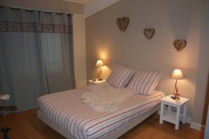 Postel nebo postele na pokoji v ubytování Hotel Le Central