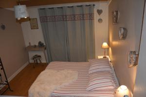 Postel nebo postele na pokoji v ubytování Hotel Le Central
