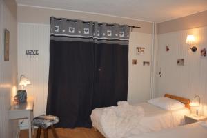 Postel nebo postele na pokoji v ubytování Hotel Le Central