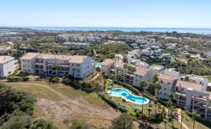 an aerial view of a large apartment complex with a pool at VIP AL FATTAh LUXURY in Estepona