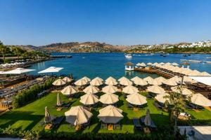 an aerial view of a resort with a body of water at The Sign Highlight Hotel in Bodrum City